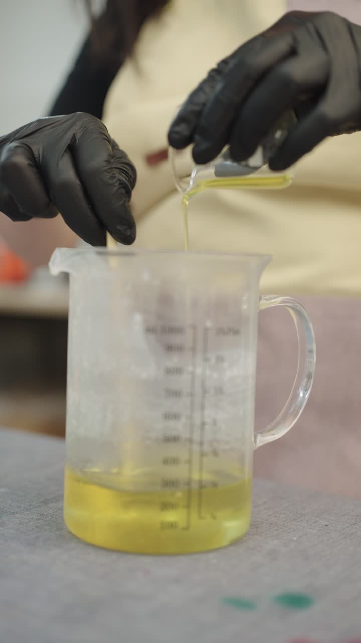 Pouring liquid into a measuring cup