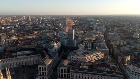 aerial panoramic view of milan at sunset, smart city with haze polluted cityscape