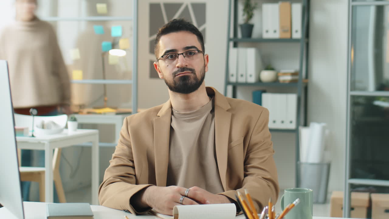 Time Lapse of Businessman Posing in Office during Workday