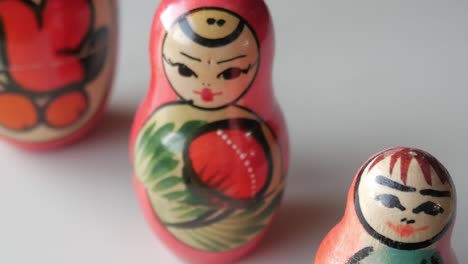 a close-up of colorful matryoshka dolls with detailed hand-painted faces and designs