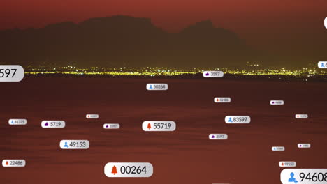 animation of social media icons over sunset and sea landscape