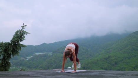 woman exercising outdoors in a mountain view