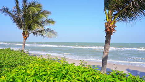 A-warm-tropical-breeze-blows-across-a-deserted-white-sand-beach