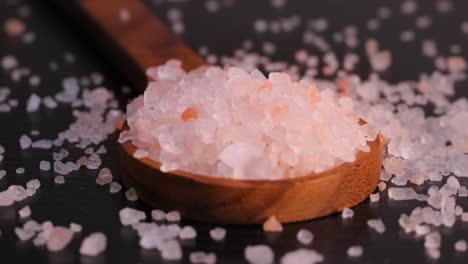 himalayan pink salt in a wooden is used to flavor food. due mainly to marketing costs, pink himalayan salt is up to twenty times more expensive than table or sea salt.