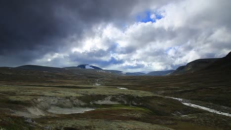 view on plateau and flowing heavy clouds