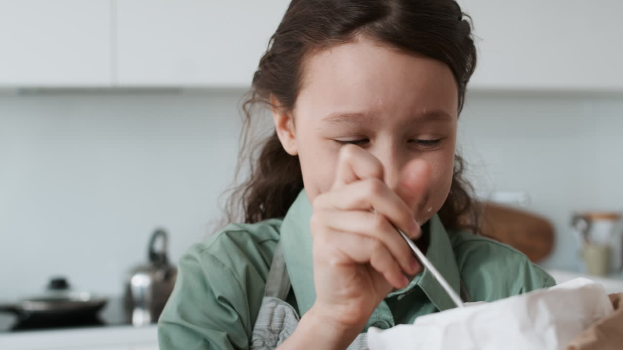 Girl playing with flour