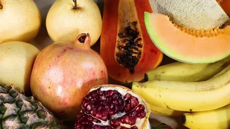 variety of fruits displayed on a white background