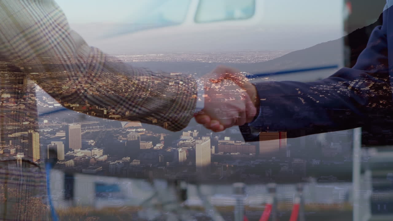 apretón de manos con la ciudad en el fondo