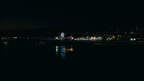 night dolly in drone shot of santa monica pier