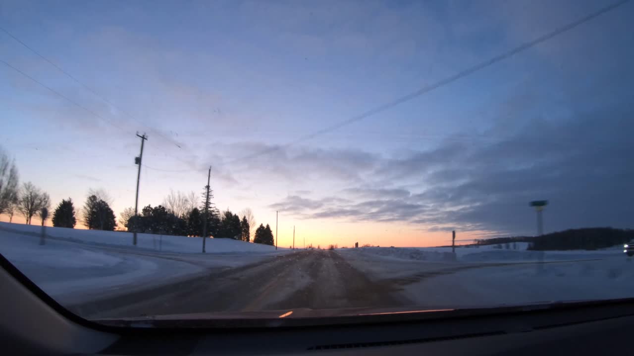 Windshield view of Wintry Drive on Rural rods