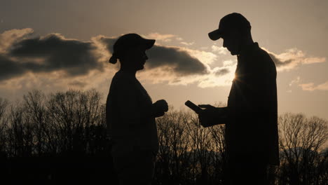 couple talking at sunset