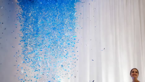blue confetti falling