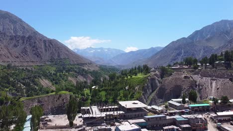 aerial view of a village nestled in a mountain valley