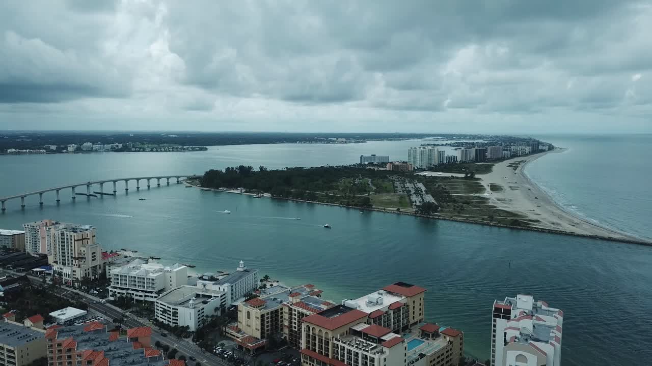 Aerial view of Causeway Bridge and hotels  in Clearwater, Florida with Dark CLouds