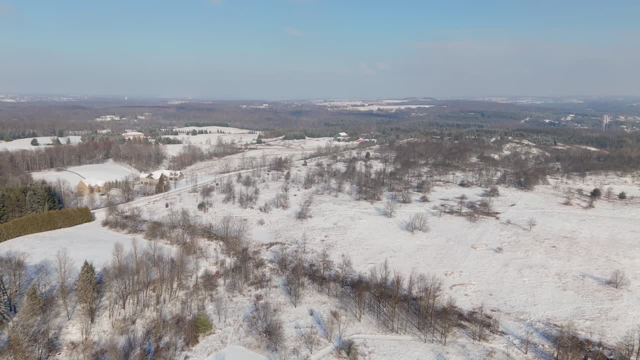 Scenic Rural Winter Landscape Covered In Snow At Caledon In Canada, Aerial Flyover.