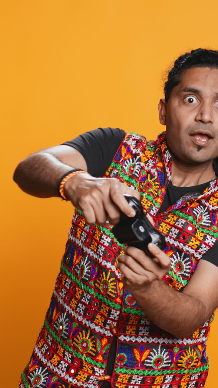 Man Playing Video Game with Controller Showing Various Emotions