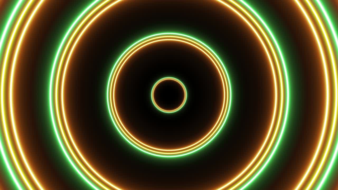 Group of orange, yellow and green circles seamless loop animation on a dark background. Abstract futuristic flight in tunnel motion graphic