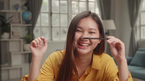 funny beauty blogger laugh, smile and talking to camera at home studio