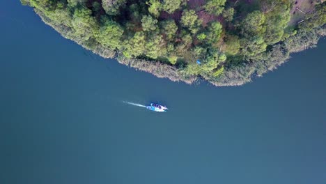 overhead view of two boats sailing on still water of lake bunyonyi in uganda, africa