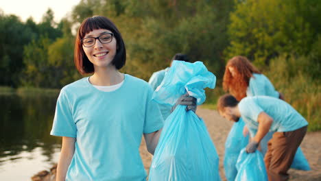 community cleanup by the riverbank