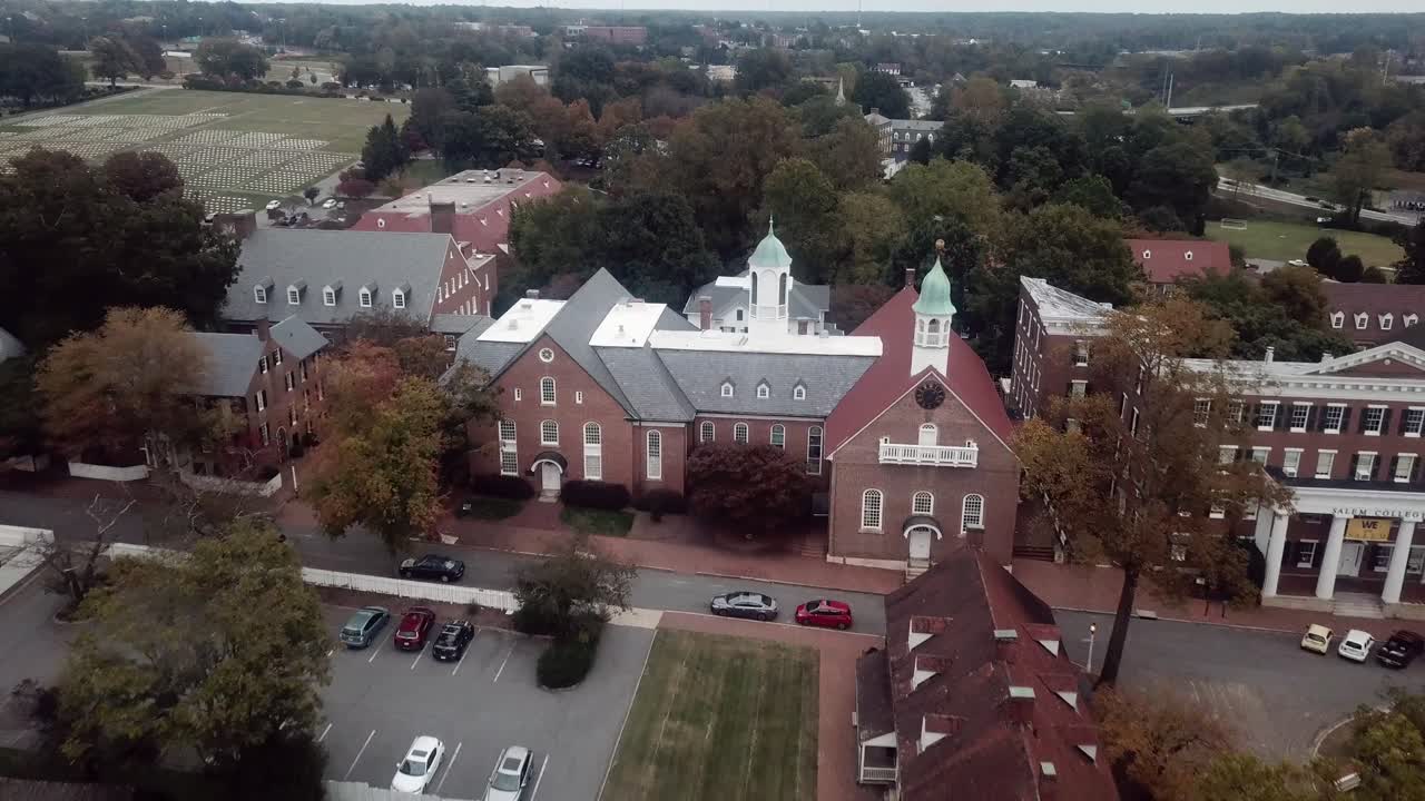 Aerial Pullout from Home Moravian Church in Old Salem in Winston Salem in Fall in 4k