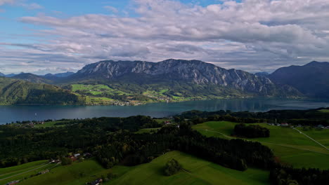 attersee lake with mountains in background, aerial view