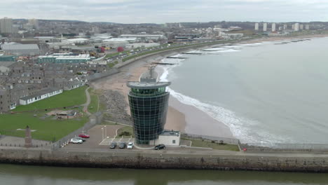 aerial view of aberdeen harbour shipping control centre on a cloudy day, aberdeenshire, scotland