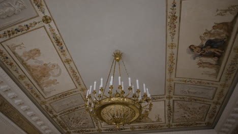 ornate ceiling with chandelier in a palace
