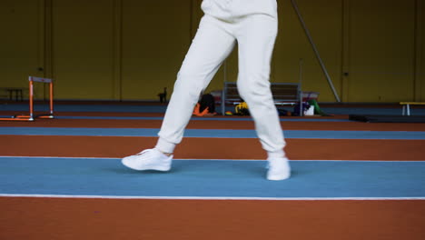 senior woman warming up indoors