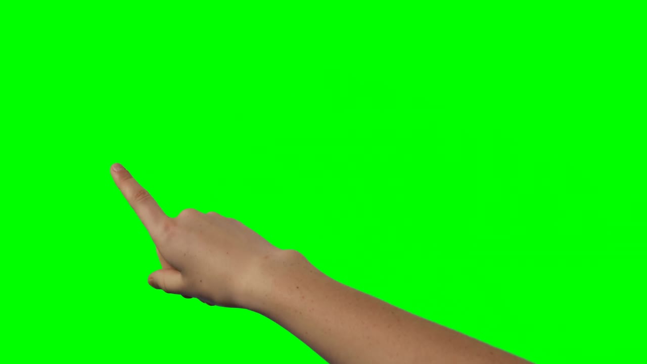 Person making hand gesture against green screen background