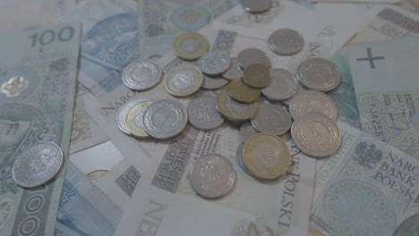 View-Of-Scattered-Polish-Coins-On-Variety-Of-Polish-Banknotes