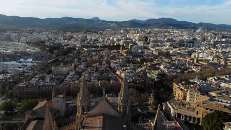 drone footage over the cathedral and city of palma de mallorca