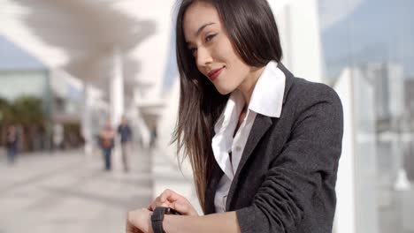 attractive woman checking the time