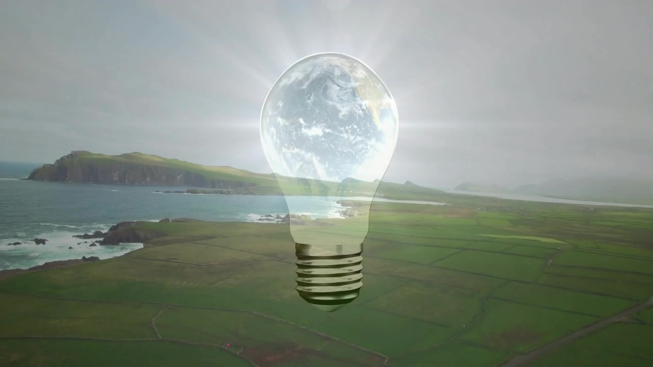 Lampadina che appare sopra la costa, globo all'interno che si illumina, ruotando mentre i raggi pulsano per evidenziare la Terra