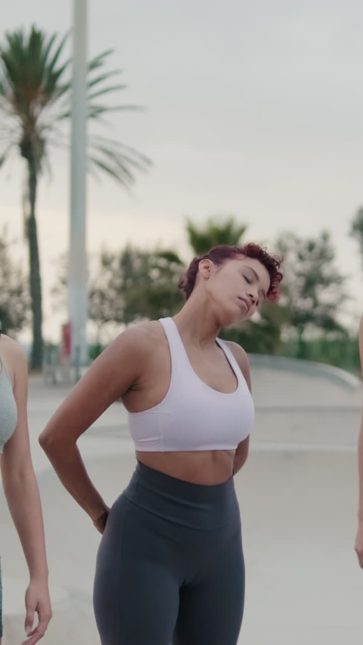Diverse Women Warming Up at Outdoor Gym