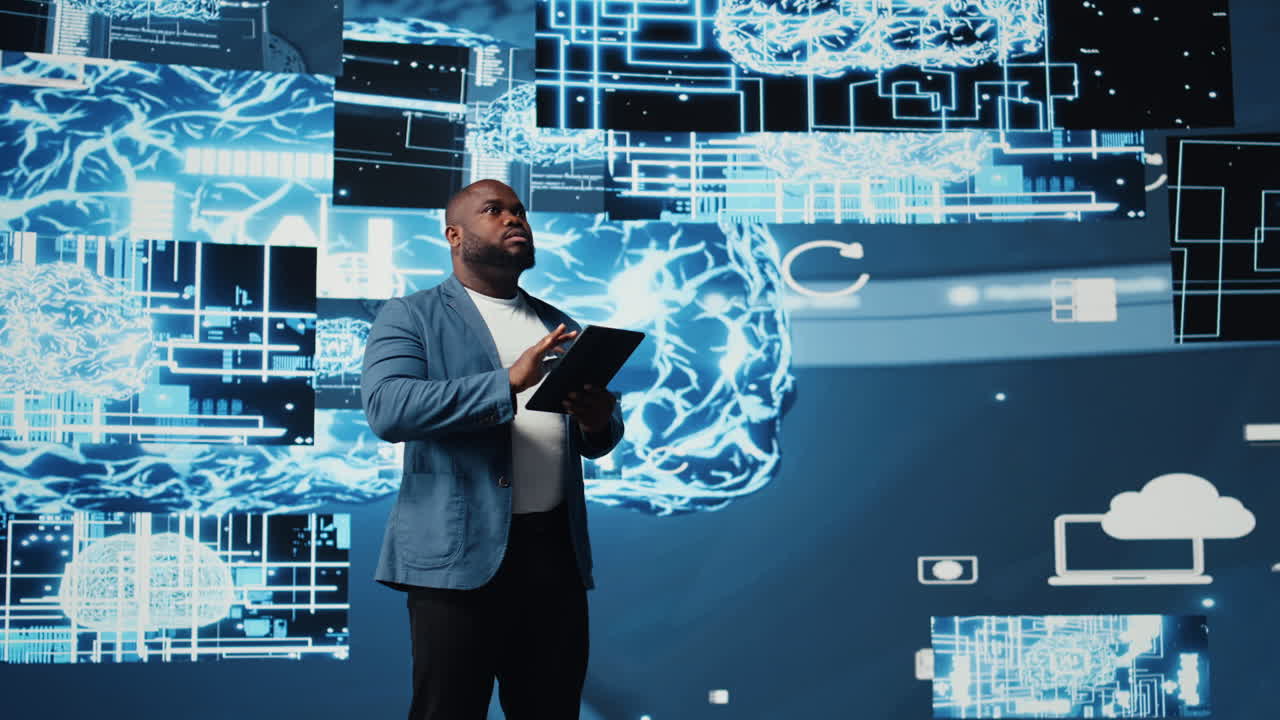 Black male IT engineer examining digital AI brain interface on dashboard