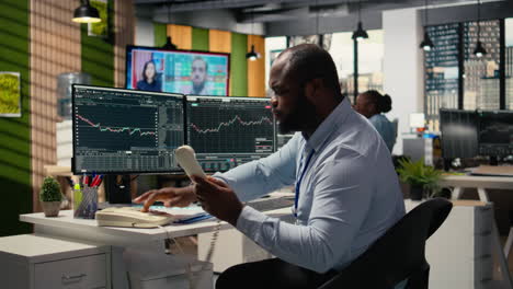 stockbroker shocked by news of black swan event shaking global finance
