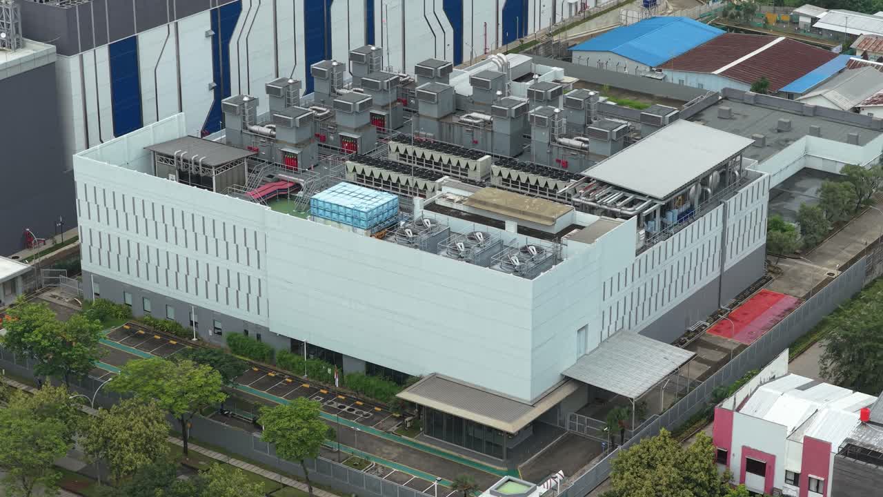 Aerial View of a Large Industrial Building with Rooftop HVAC Systems