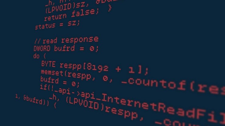Animatie van rode programmeercode met gele abstracte lijnen op een donkere achtergrond.