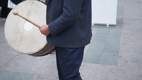 man playing a turkish drum