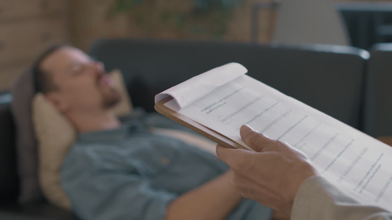 Unrecognizable Psychotherapist Working with Patient