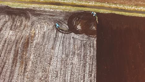 drawing on a plowed snow field. traces of tractor wheels. getting ready for the new season.
