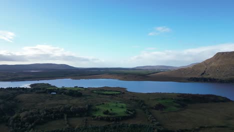 A-stunning-aerial-view-of-the-Connemara-Loop-on-a-sunny-day-in-Galway-County,-Ireland