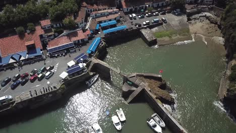 historic port des pêcheurs in biarritz, boats moored in harbor, france. aerial top-down pov
