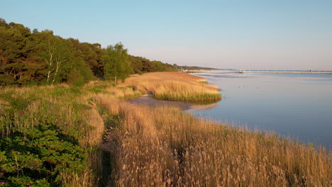 scenic and pristine natural areas along jurata coastline, hel peninsula, aerial