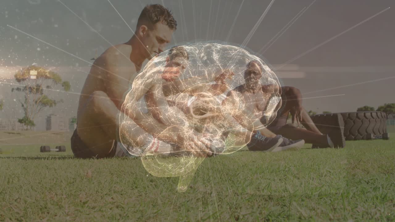 Atleta uomo che si stende sul campo ed esegue crunch, con una sovrapposizione di un cervello pulsante che aumenta la forza.