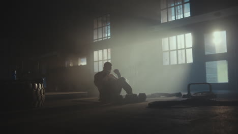 man resting after intense workout session