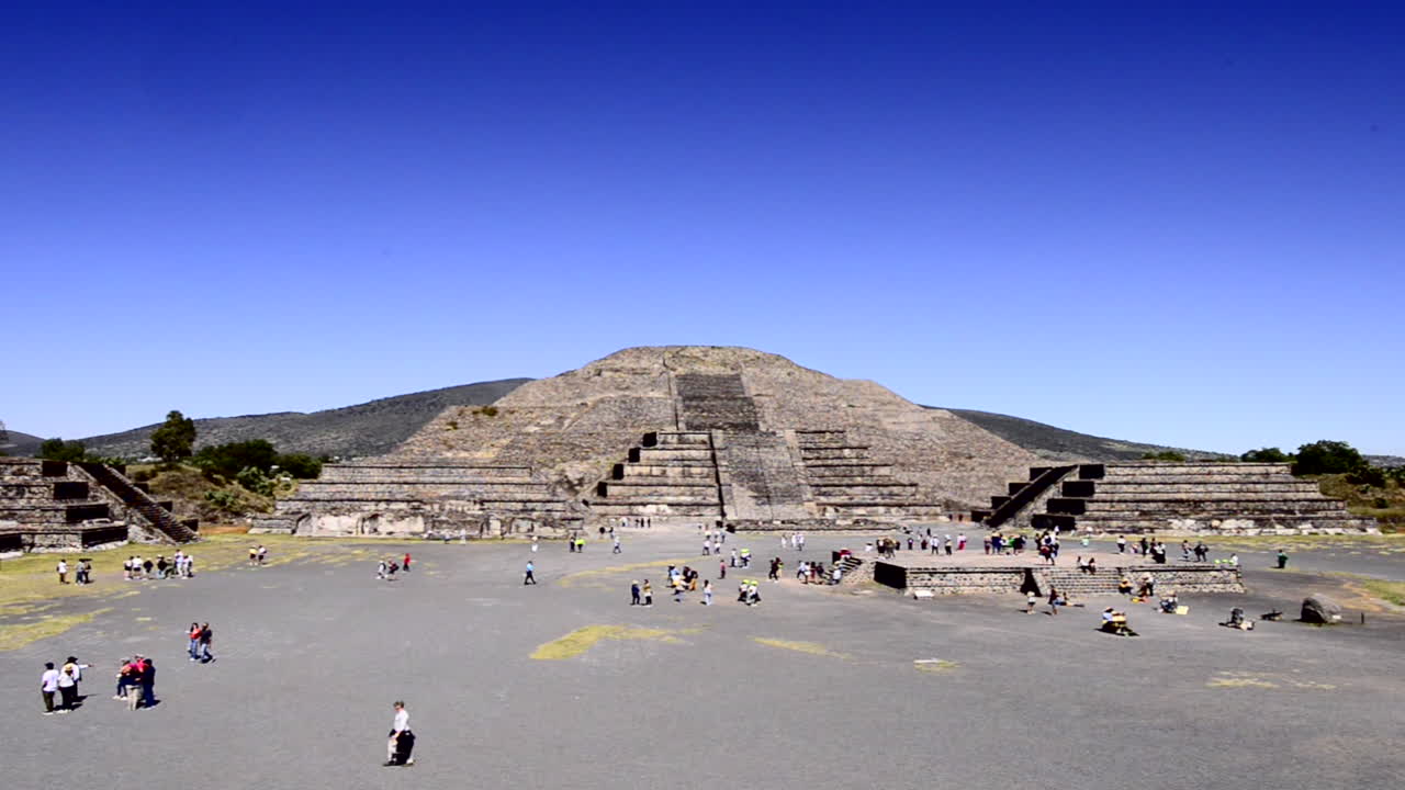 Pyramid of the sun in Teotihuacan with tourists. Archaeological prehispanic indigenous aztec city