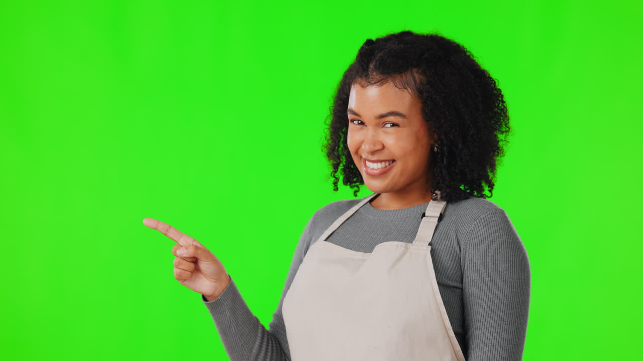 Woman in apron pointing