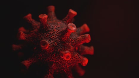 Mikroskopische-Nahaufnahme-Der-Roten-Blutkörperchen-Des-Coronavirus-Auf-Schwarzem-Hintergrund